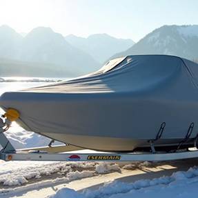 Tarp protecting equipment at a commercial worksite